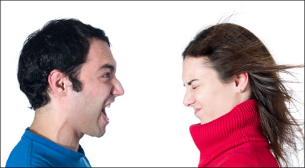 man screaming at woman