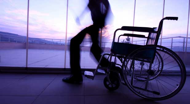 Man walks from Wheelchair