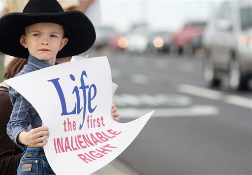 ap_abortion_boy_sign.jpg