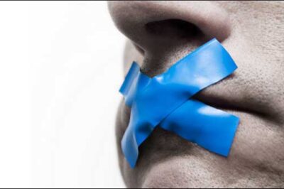 Man with mouth taped shut
