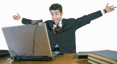 Happy man at Computer