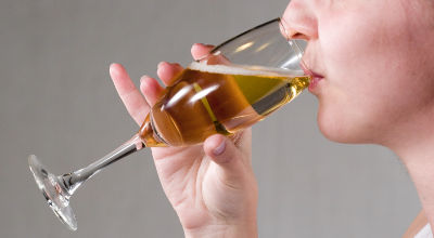 woman drinking champagne