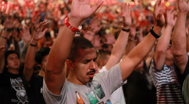 Man raising hands