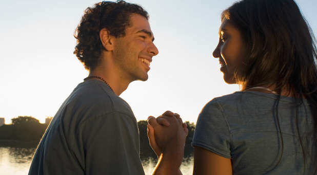 Couple holding hands