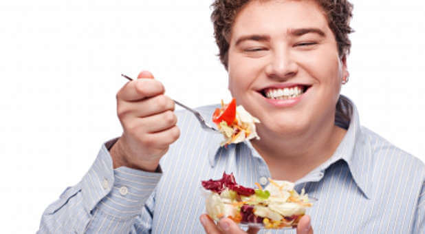 Man eating salad