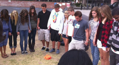 students praying