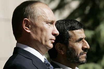 Russian President Vladamir Putin (l) and Iranian President Mahmoud Amadinejad