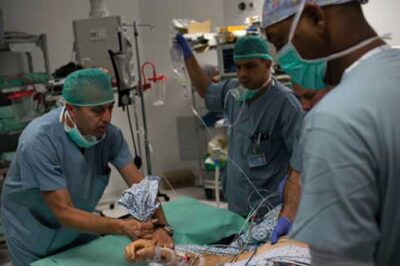 A Syrian man is carried to a surgery room in the Israeli city of Safed.