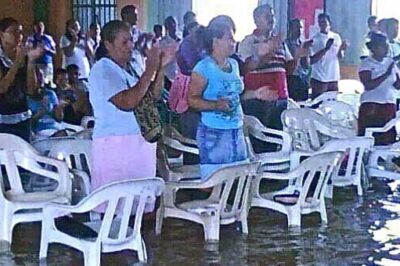 Worshippers after typhoon