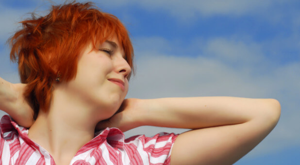 woman looking up to the sky