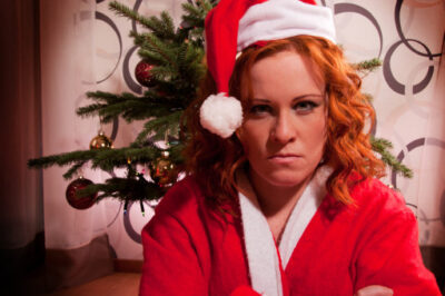 upset woman in Santa costume