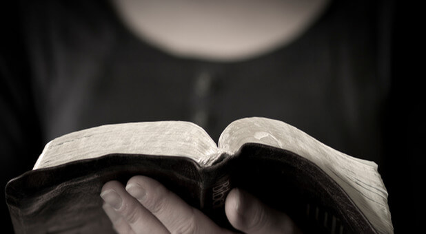 woman reading bible