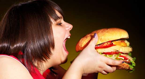 Woman binge eating