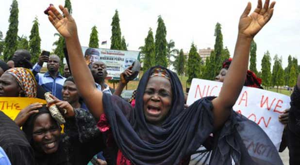 A group of Nigerian women, whose daughters were kidnapped by the Islamist terrorist group Boko Haram a month ago, pray and plead for the safe return of their children.