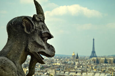 Stone devil gargoyle on Notre Dame Cathedral, Paris