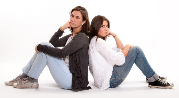 teenager and parent in fight