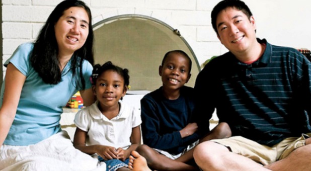 Huang couple and adopted klds