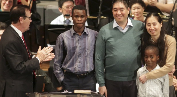 Huang family back in their home church