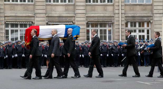 A funeral for one of the victims in the French terrorist attacks.