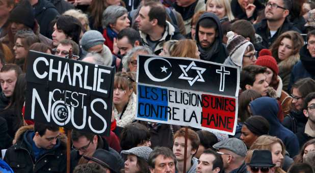 French citizens stand in solidarity with Charlie Hebdo.