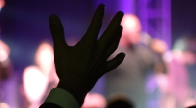 hand held up in worship