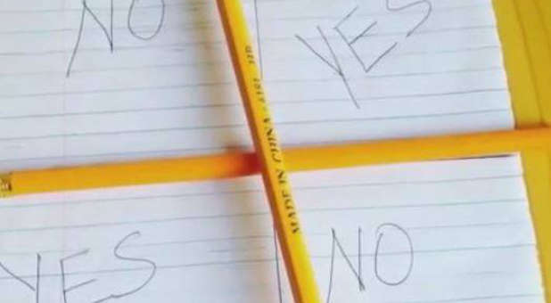 A Charlie Charlie game board