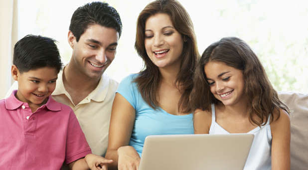 Family around computer