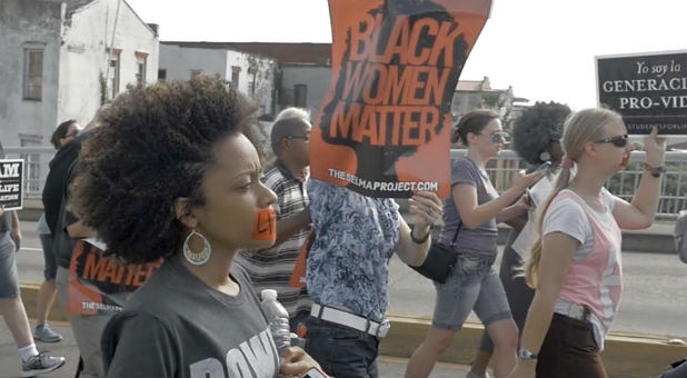 Intercessors march for life across the Edmund Pettus Bridge in Selma, Alabama.