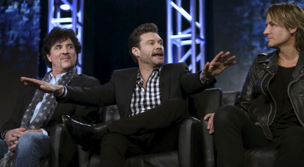 Host Ryan Seacrest, mentor Scott Brochetta and judge Keith Urban of