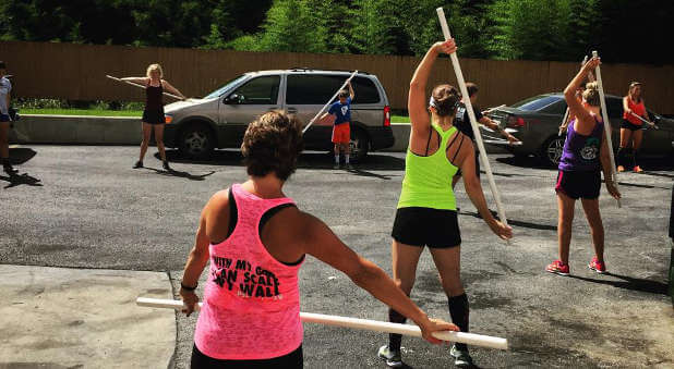 A few of our CrossFitters at my and my husband's gym, CrossFit 925, doing around-the-worlds!