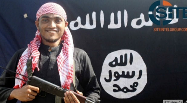 A still image taken from video of the SITE Intel Group's Twitter page shows an undated photo of a man with a gun.