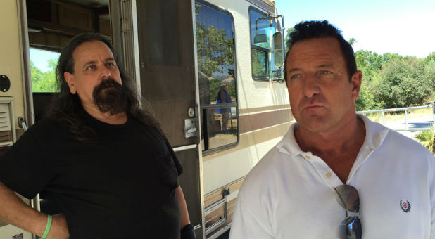 Pastor Scott Wagers, right, and Mercy Mobile driver Robert Aguirre drive the Mercy Mobile to various homeless encampments in Silicon Valley.