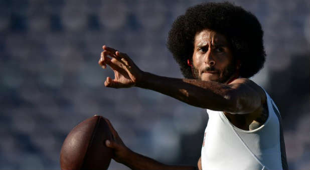 San Francisco 49ers quarterback Colin Kaepernick throws a pass before the game against the San Diego Chargers at Qualcomm Stadium.
