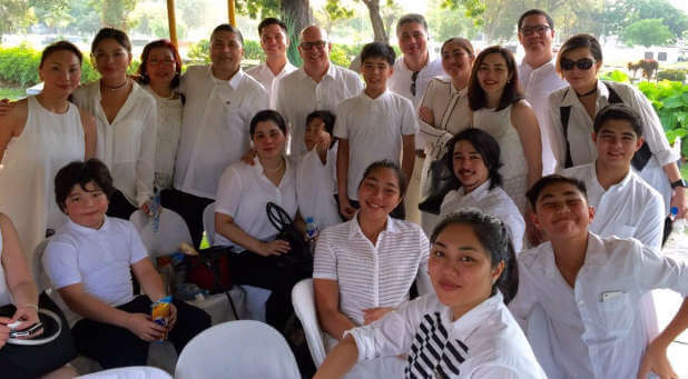 Steve Murrell (top center) and the family of Salvador Fabregas