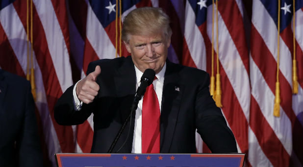 Donald Trump greets supporters during his election night rally in Manhattan.