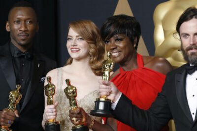 Best Supporting Actor winner Mahershala Ali (L-R), Best Actress winner Emma Stone, Best Supporting Actress winner Viola Davis and Best Actor winner Casey Affleck pose with their Oscars.