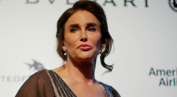 Caitlyn Jenner poses for photographers at the 2017 Elton John AIDS Foundation Academy Awards Viewing Party in Los Angeles, California