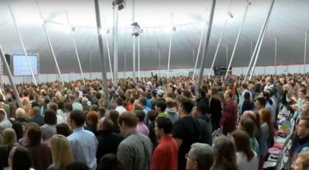 This tent revival in Burlington, North Carolina, is experiencing the power of the Holy Spirit.