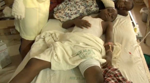 A still image taken from a video uploaded by CHANNELS TV on Aug. 6, 2017, shows injured people lying inside