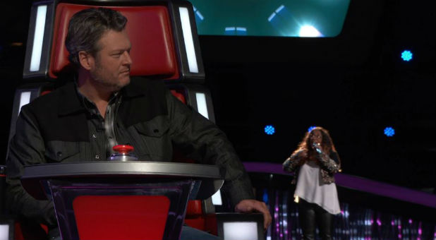 Blake Shelton prepares to turn around on