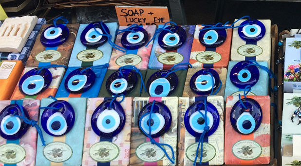 Soaps sold with nazars, charms used to ward off the evil eye, at the Monastiraki market in Athens, Greece.