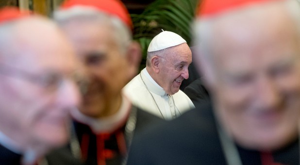 Pope Francis greets the Roman Curia on the occasion of Christmas in the Clementine Hall at the Vatican.