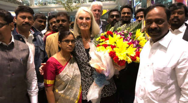 Anne Graham Lotz and her security team head (C) are greeted by her host, government official MK D. Rajeswar Rao (front R) and a team of pastors.