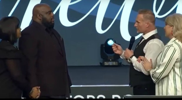 The Grays accept the key to the Redemption/Relentless Campus.