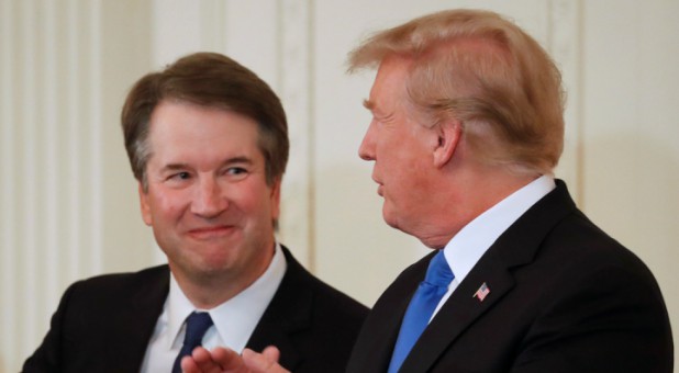 U.S. President Donald Trump and his nominee for the U.S. Supreme Court, Judge Brett Kavanaugh.