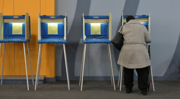 A voter fills out her ballot at an early voting polling station in Milwaukee, Wisconsin.