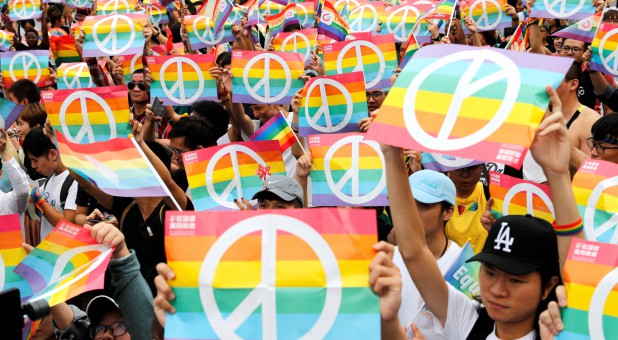 Same-sex marriage supporters take part in a lesbian, gay, bisexual and transgender (LGBT) pride parade.