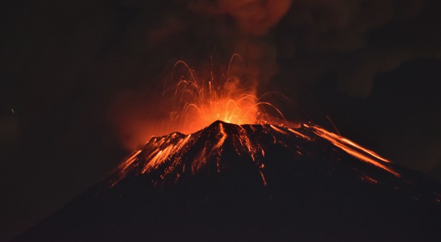 Smoke rises from the Popocatepetl as it spews incandescent volcanic material on the outskirts of Puebla, Mexico.