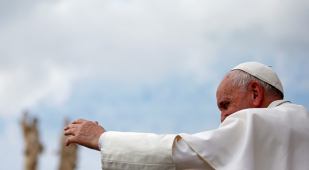 Pope Francis greets faithful at the end of the weekly general audience at the Vatican.