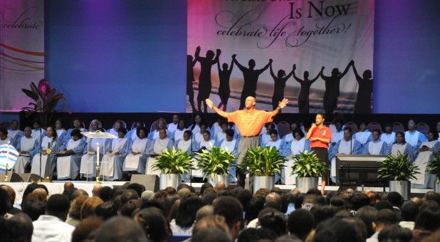 Kirbyjon Caldwell ministers at his church.